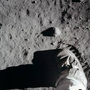 astronaut boot and footprint on the moon